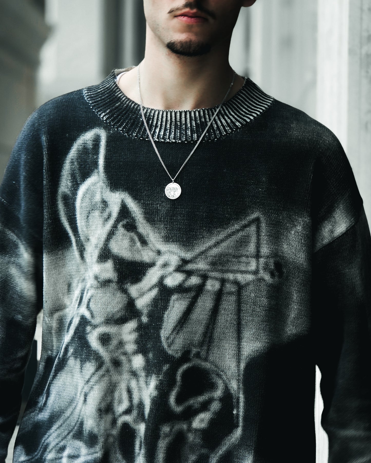 RISEN WARRIOR KNIT SWEATER