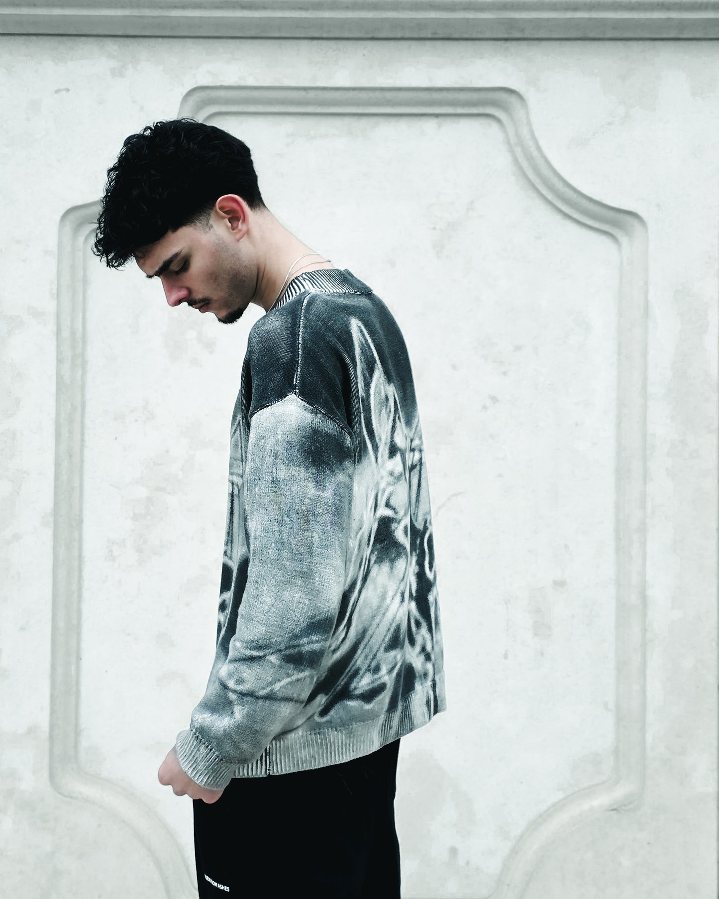 RISEN WARRIOR KNIT SWEATER